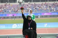 دختر مدال‌آور ایران با چادر روی سکو رفت!