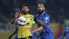 روزبه چشمی ذر کنار محمد دانشگر