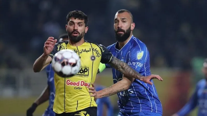 روزبه چشمی ذر کنار محمد دانشگر