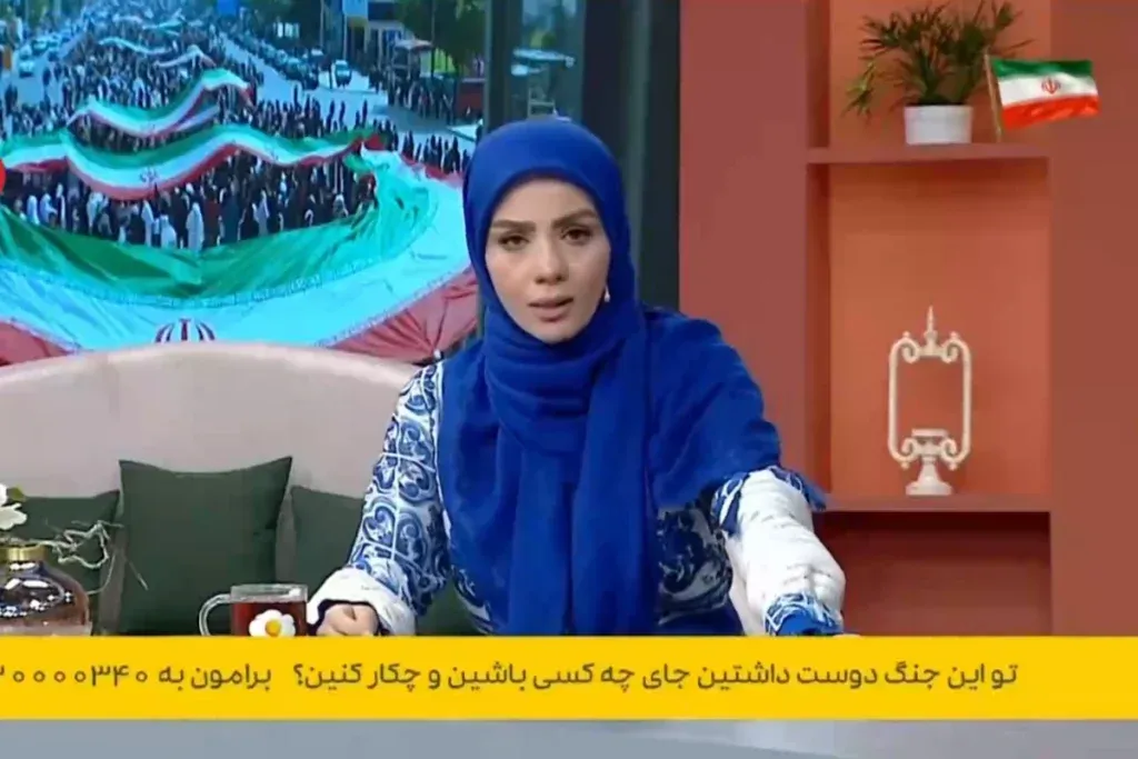 مجری زن تلویزیون با اسلحه 